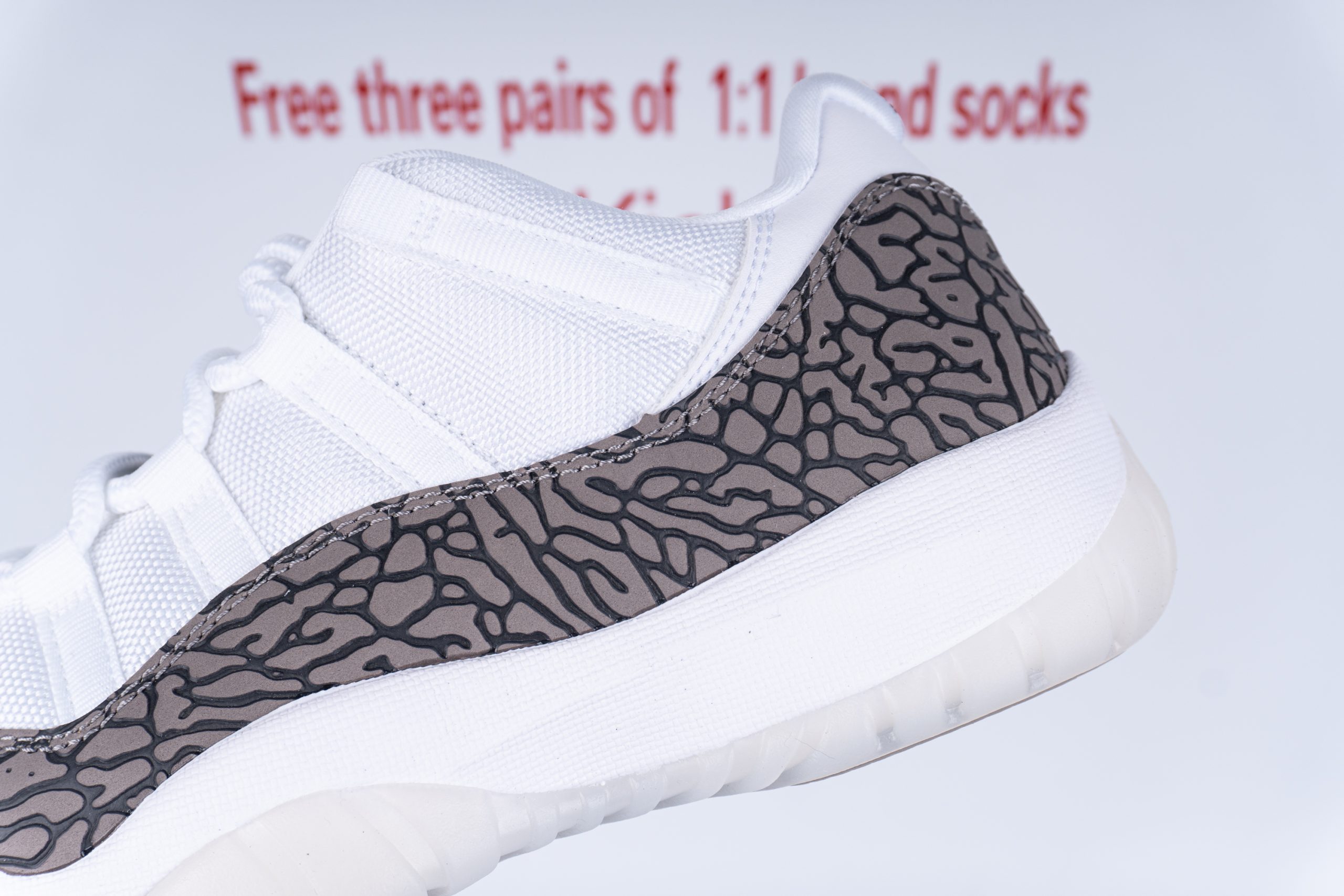 Jordan 11 Retro Low IE White Cement
