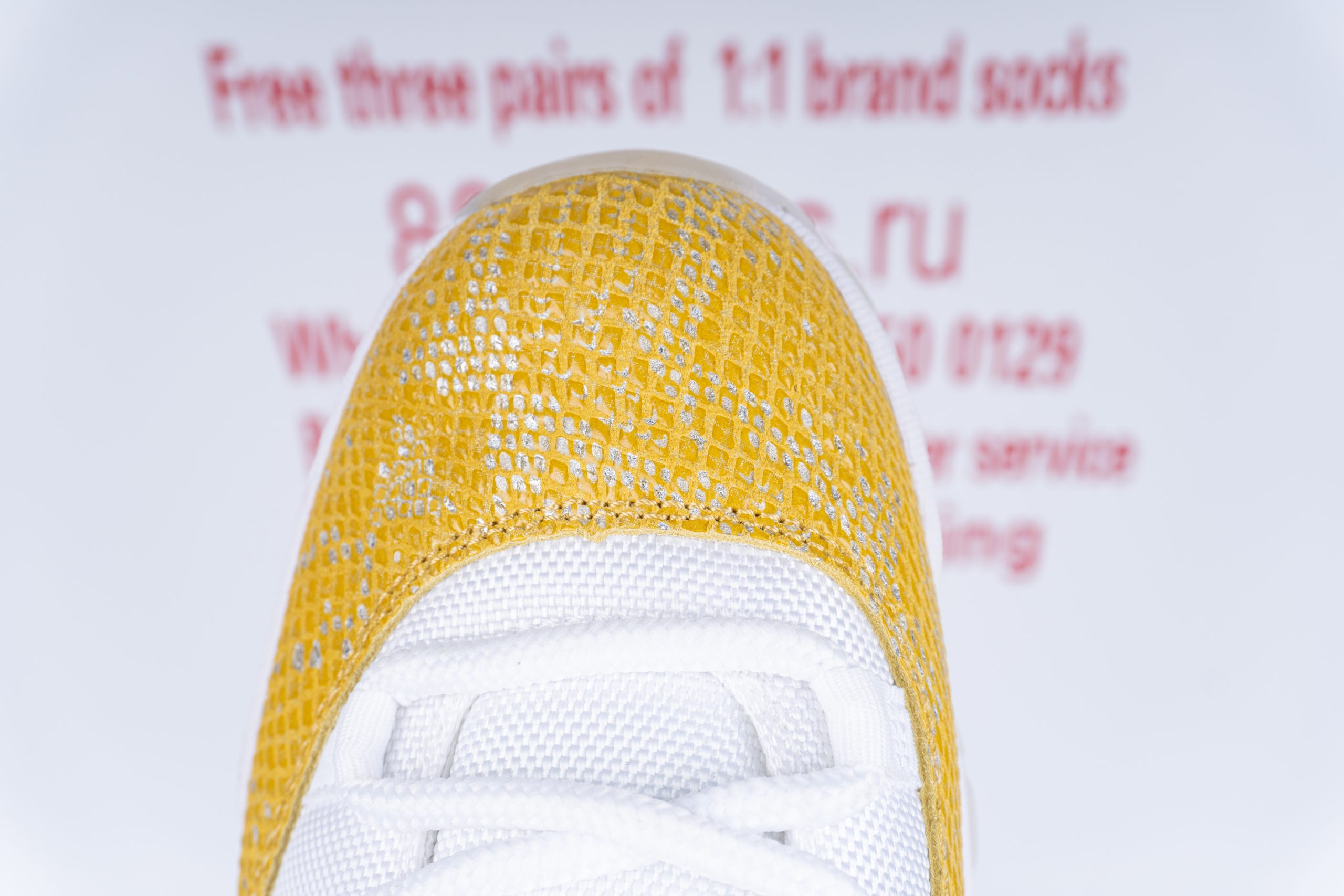 Jordan 11 Retro Low Tour Yellow Snakeskin