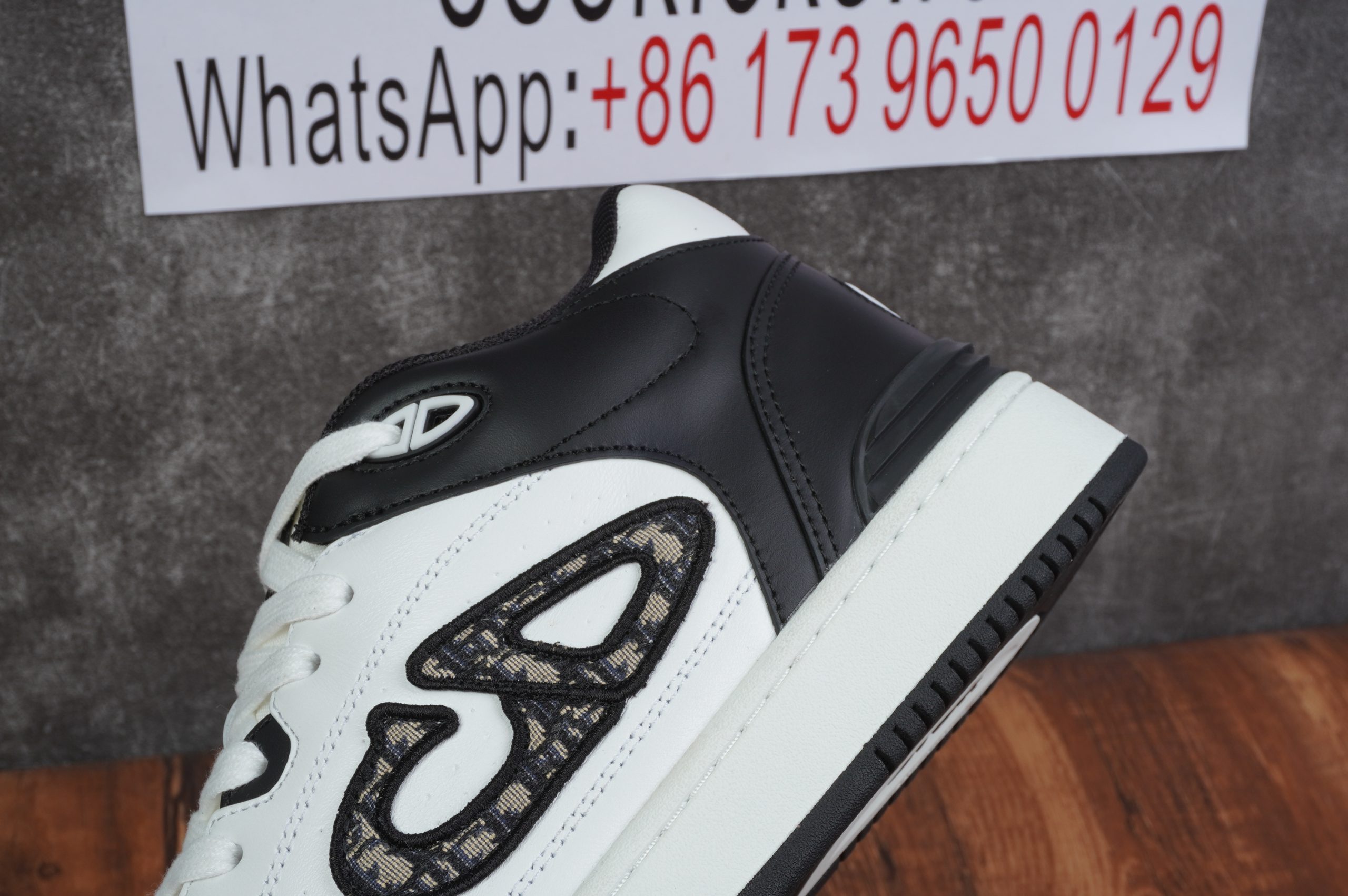 D*or b57 mid-top sneaker black and white